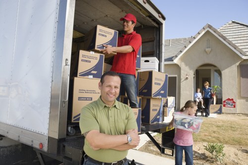 Professional movers loading truck in Wimbledon